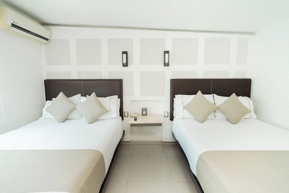 Standard Room (2 camas matrimoniales)