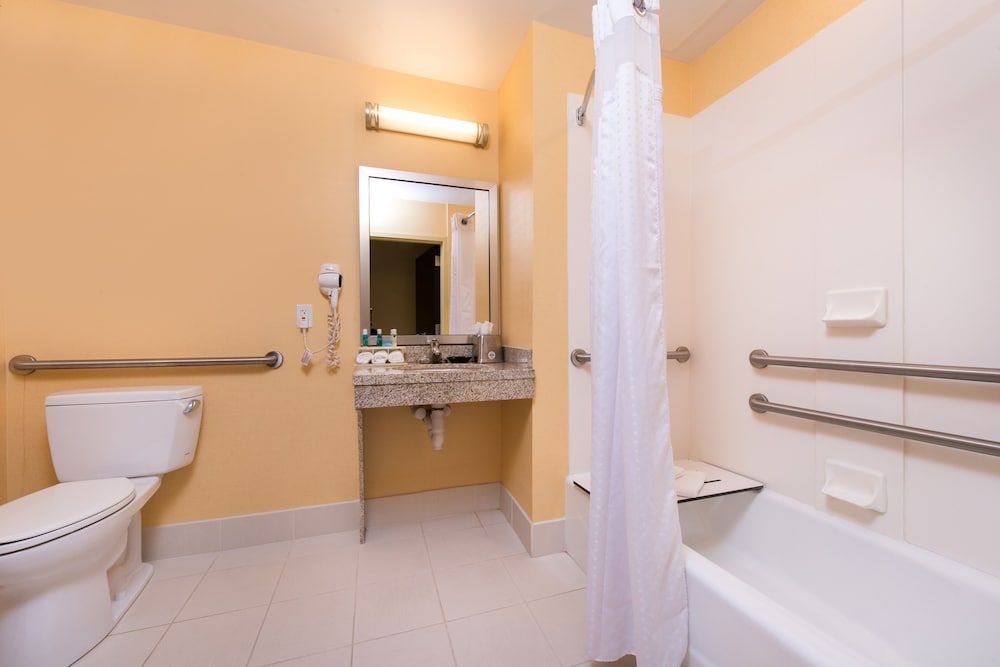 Suite, 1 King Bed, Accessible Bathtub (Communications)