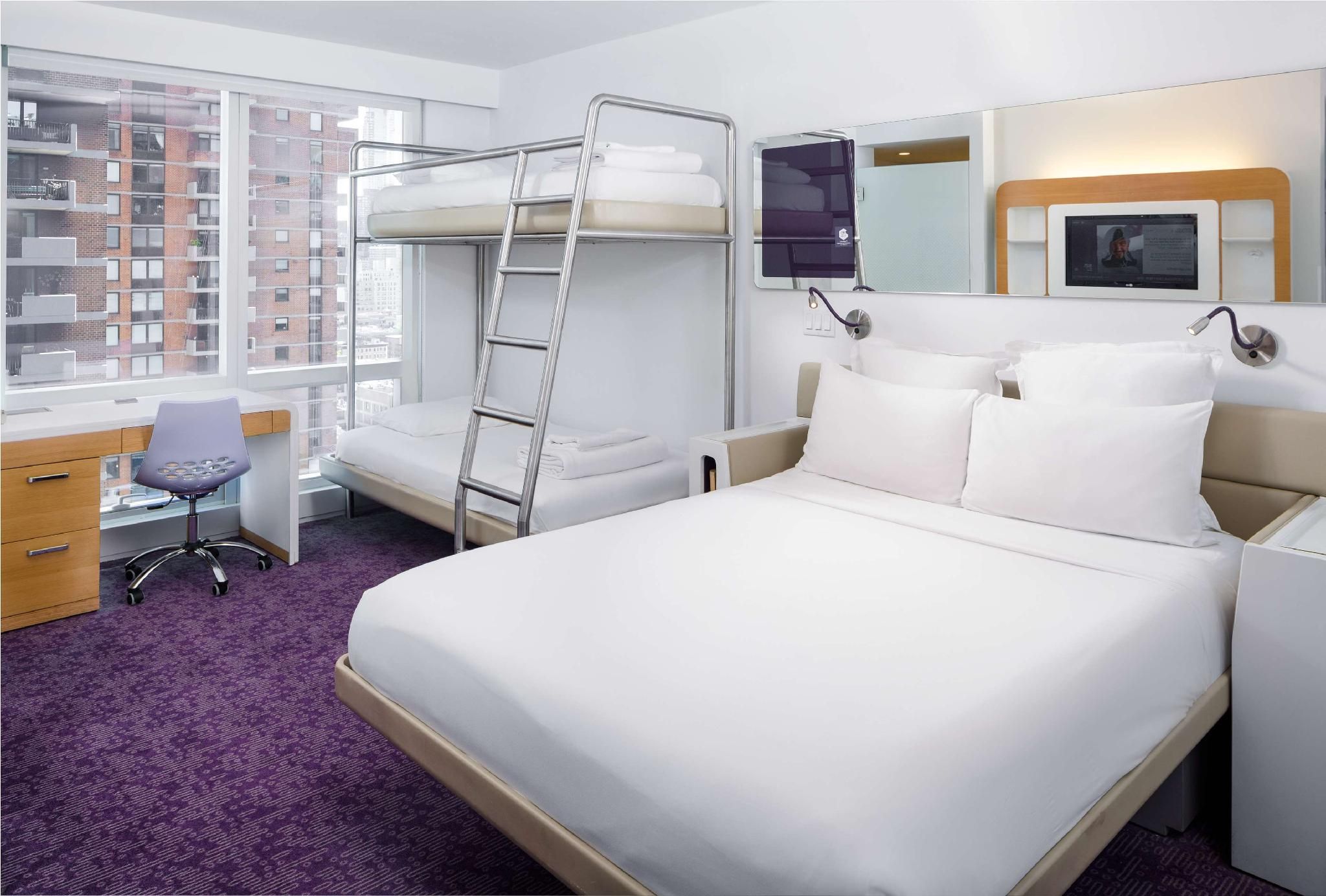 First Class Junior Suite with Queen and 2 Bunk Beds