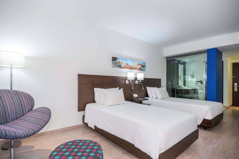 NH Collection Barranquilla Smartsuites Royal Superior Room 3