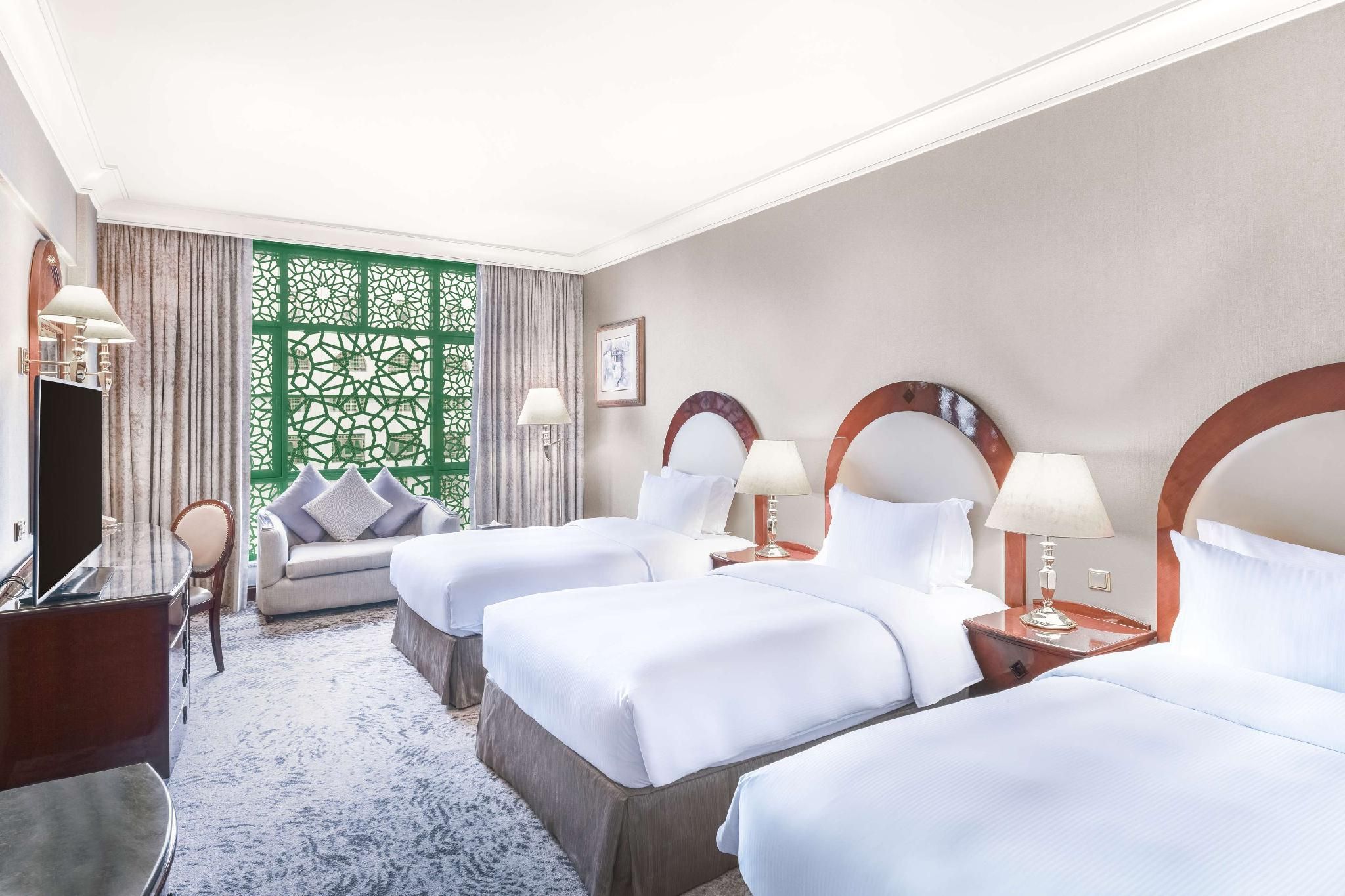 DELUXE ROOM THREE BED PARTIAL HARAM