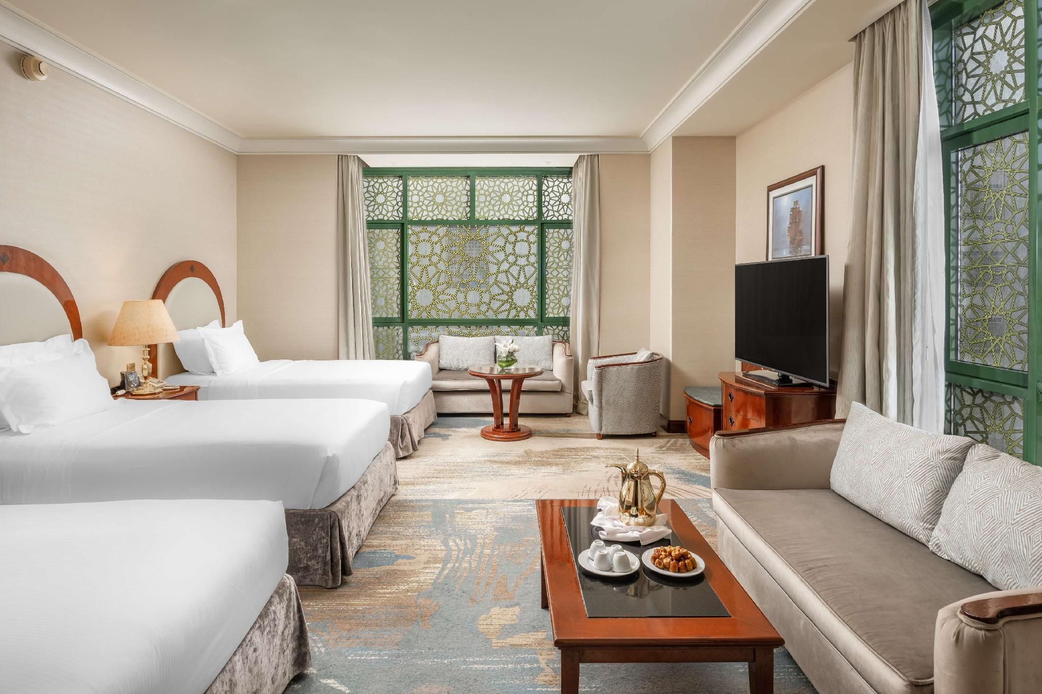 DELUXE ROOM THREE BED PARTIAL HARAM