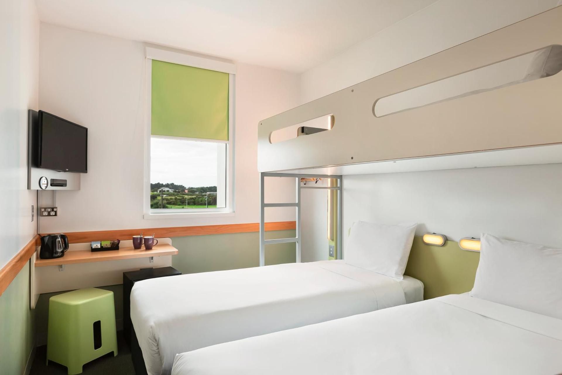 Standard Room with 2 single beds and a bunk bed