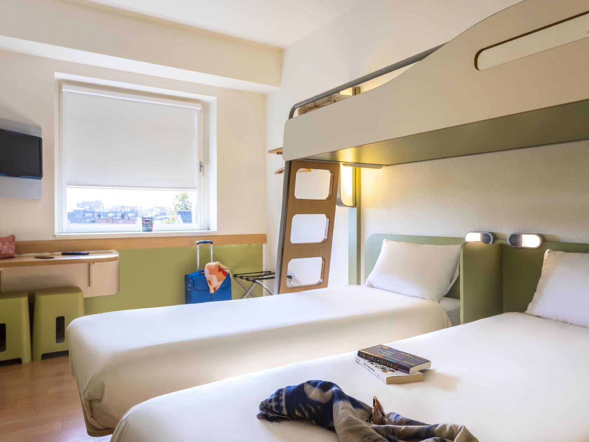 Standard Room with 2 single beds and a bunk bed