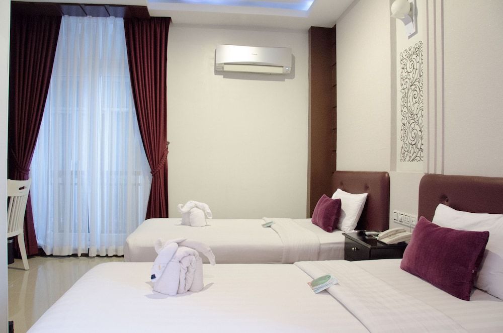 King Grand Boutique Hotel Deluxe Twin Room 3