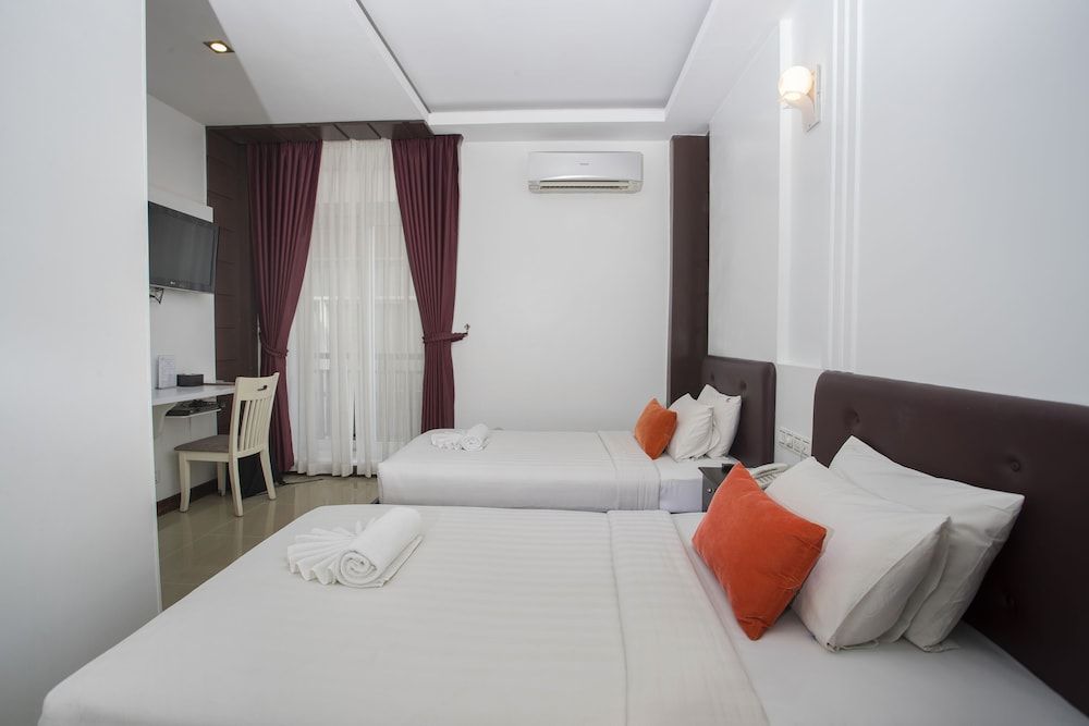 King Grand Boutique Hotel Deluxe Twin Room 4