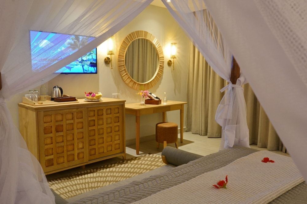 Neptune Pwani Beach Resort & Spa Zanzibar Deluxe Beachfront Room 11