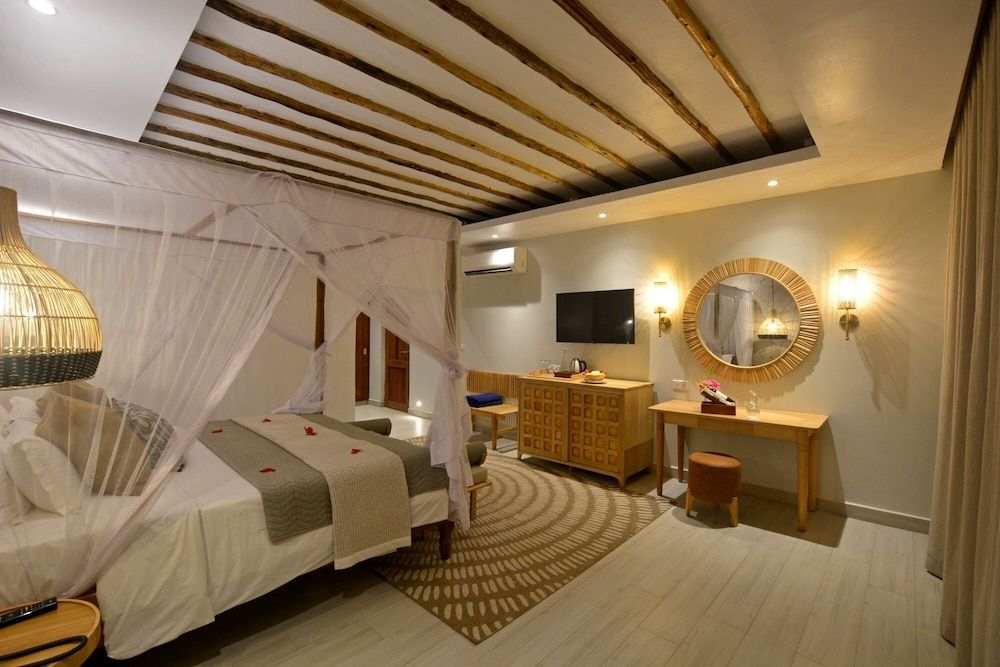Neptune Pwani Beach Resort & Spa Zanzibar Deluxe Beachfront Room 4