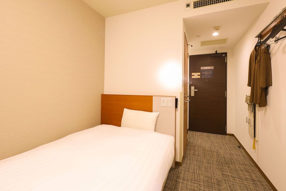 Economy Single Room, Non Smoking, Shared Bathroom