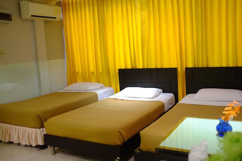 Prince House Deluxe Triple Room 9