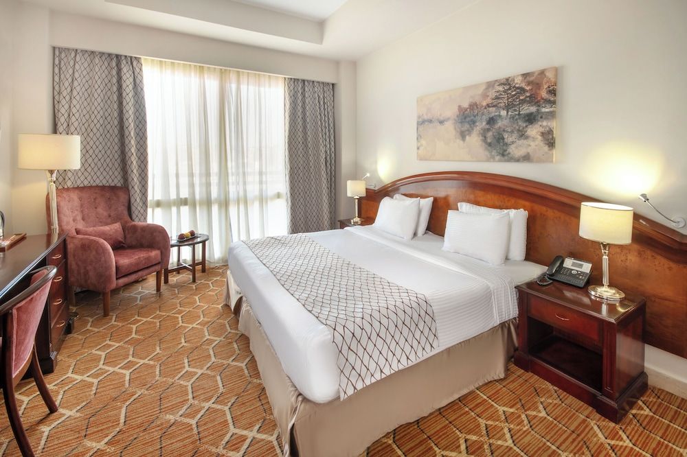 undefined Triumph Plaza Hotel