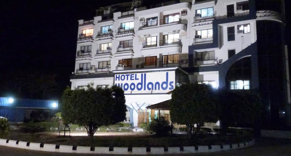 hotel woodlands vapi