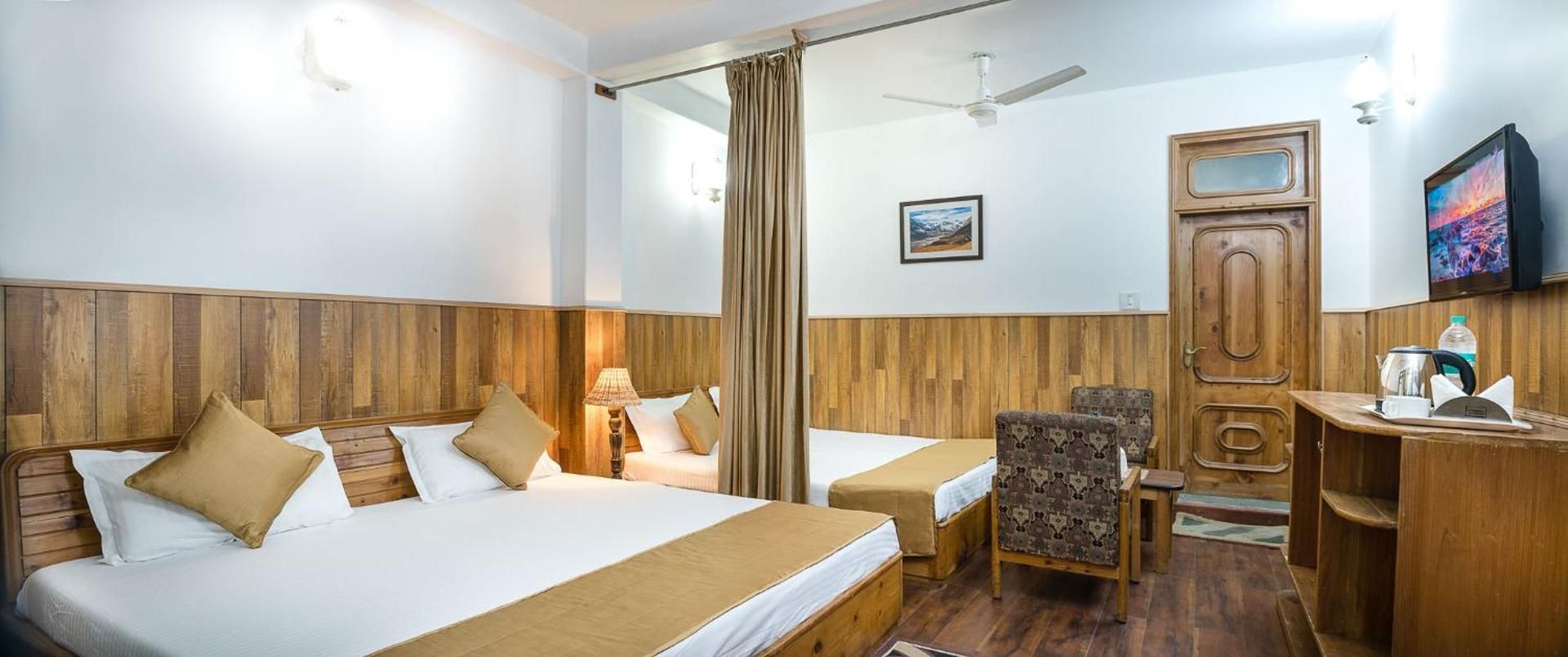 Family Room with Private Balcony and All Weather AC