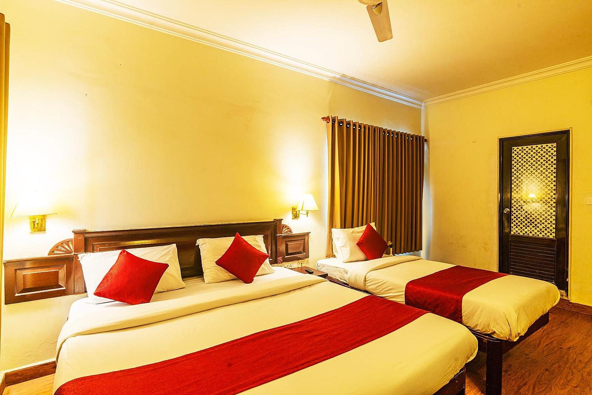 Hotel Archana Inn Deluxe Triple Room AC 3