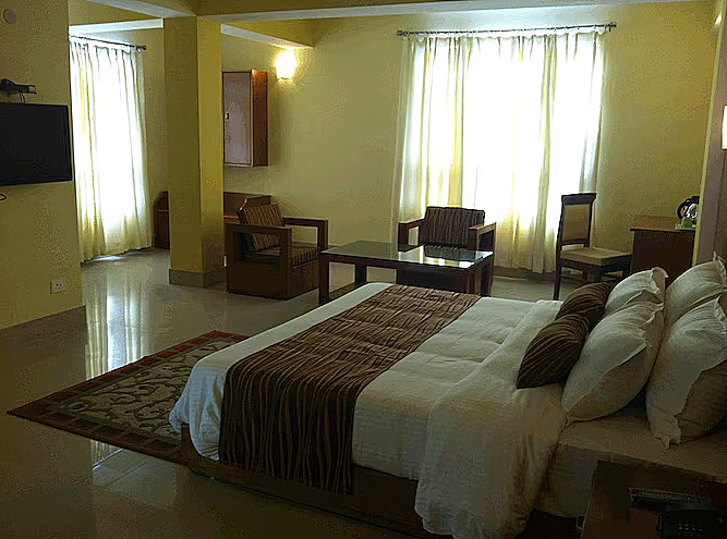 Hotel Greendale Residence  (5 Min walking from MG MARG) Deluxe Room (Bonfire available on a chargeable  basis )