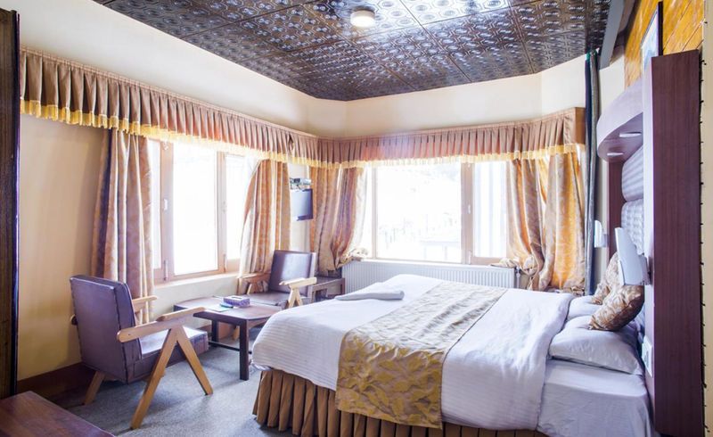 Welcome Hotel Gulmarg (Centrally Heated) Deluxe room  11