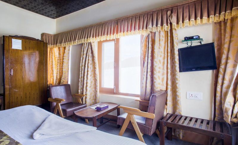 Welcome Hotel Gulmarg (Centrally Heated) Deluxe room  17