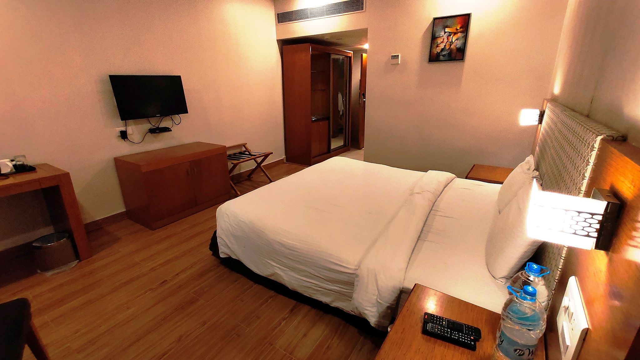 Suite-1 King Bed, Smoking Room, Separate Living Room, Dining Area, TeaCoffee, Mini Bar, Microwave