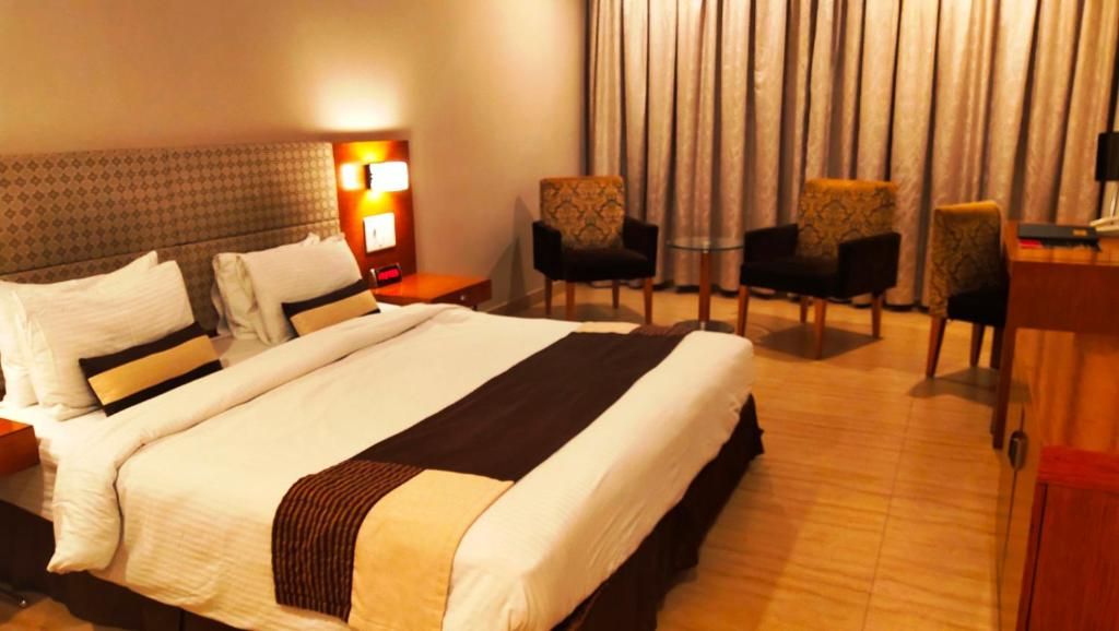 Premium Room - 01 King Bed, Smoking, Shower, Hair Dryer, Tea - Coffee Maker, 32 LCD TV, Minibar, Safe , Full Breakfast