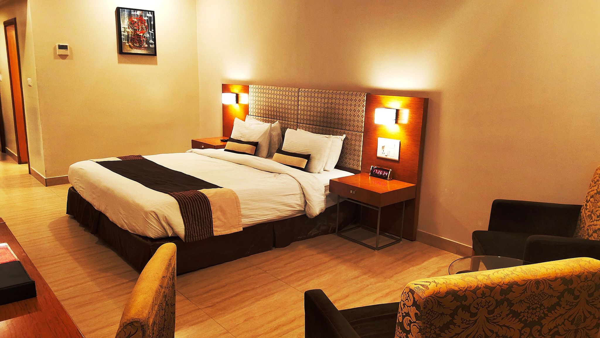 Suite-1 King Bed, Smoking Room, Separate Living Room, Dining Area, TeaCoffee, Mini Bar, Microwave