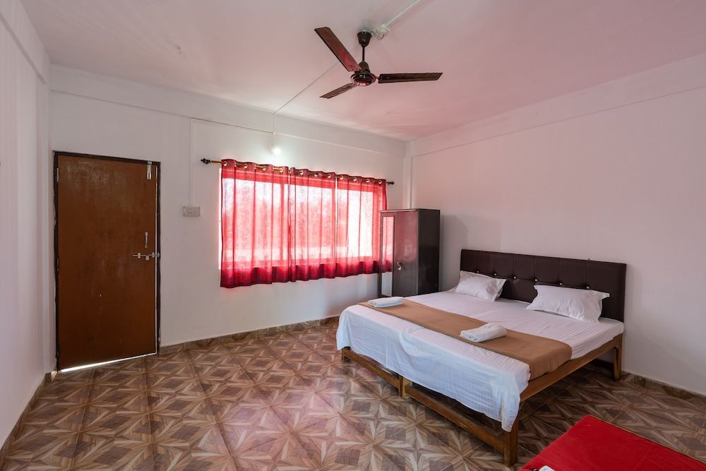 The Whispering Lake Resorts Deluxe Room