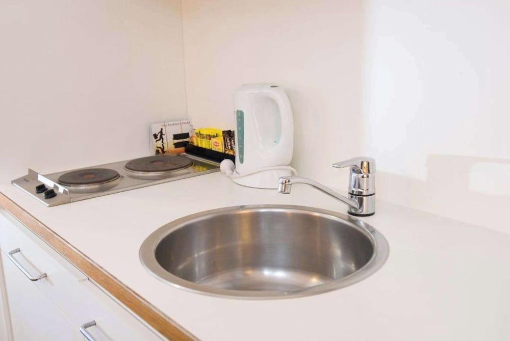 Metro Apartments on Bank Place Studio Queen Apartment 5