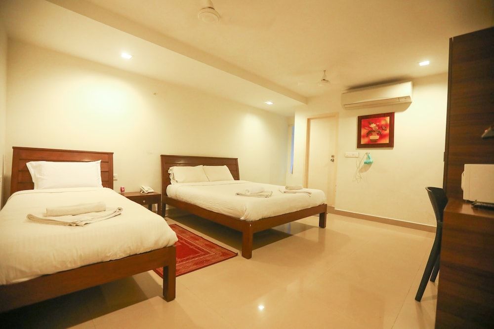 ULO Aravindar Residency Deluxe Triple Room 4