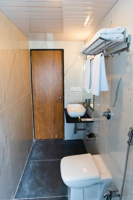 The Orange Flag Renuka Hotel  Classic Twin Room 5