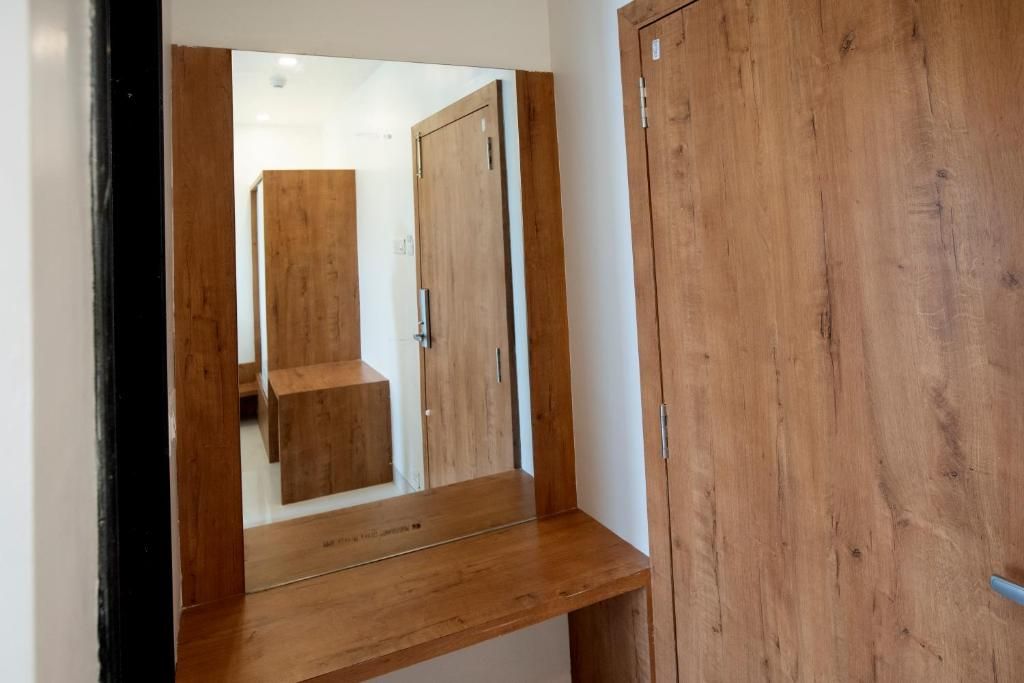 The Orange Flag Renuka Hotel  Classic Twin Room 10