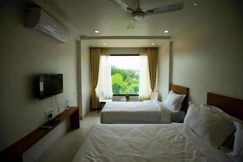 The Orange Flag Renuka Hotel  Classic Twin Room 2