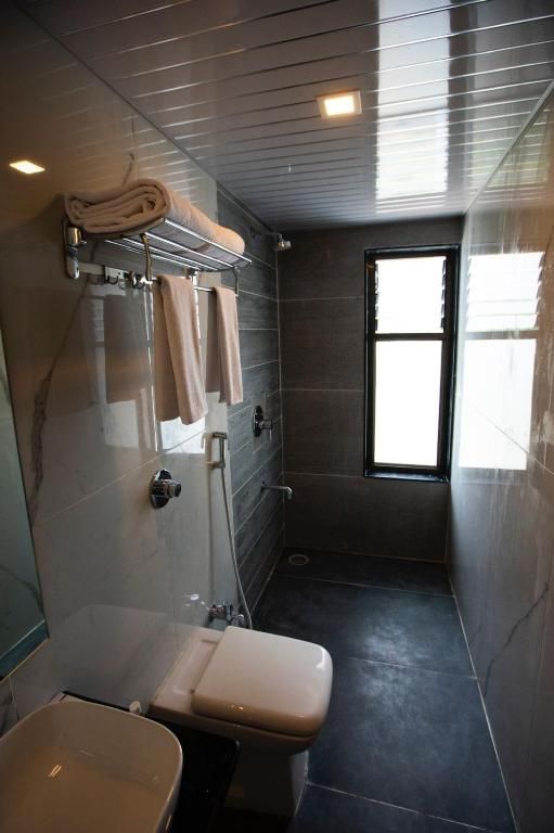 The Orange Flag Renuka Hotel  Classic Twin Room 9