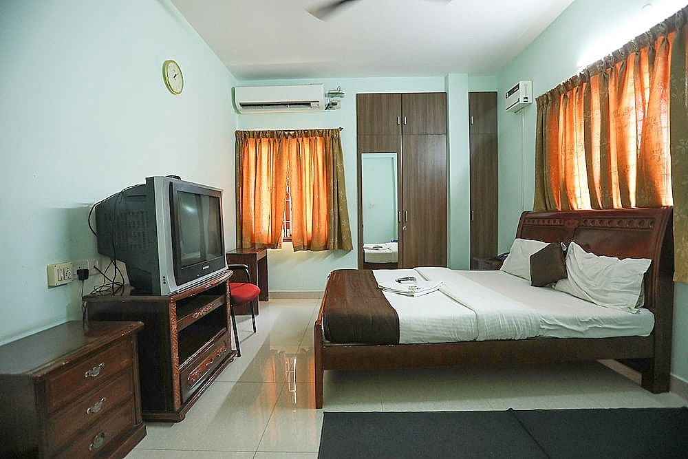 ULO Saicharan Comfort Inn Deluxe Room 6