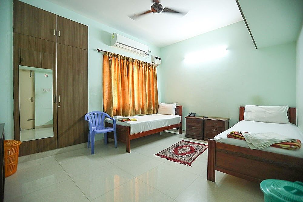 ULO Saicharan Comfort Inn Deluxe Room 7