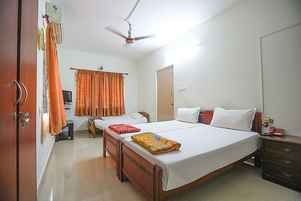 ULO Saicharan Comfort Inn Deluxe Triple Room 7