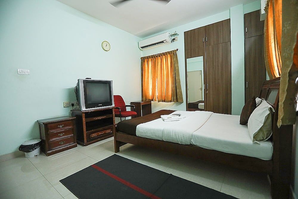 ULO Saicharan Comfort Inn Deluxe Room 16