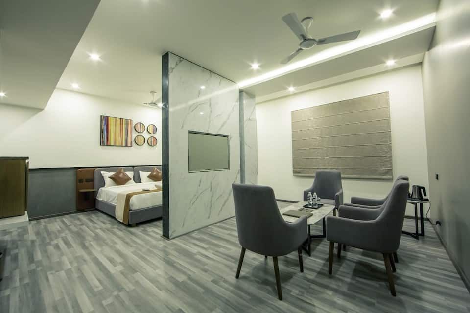 SUITE ROOM LIVING AREA AND BED ROOM VIEW