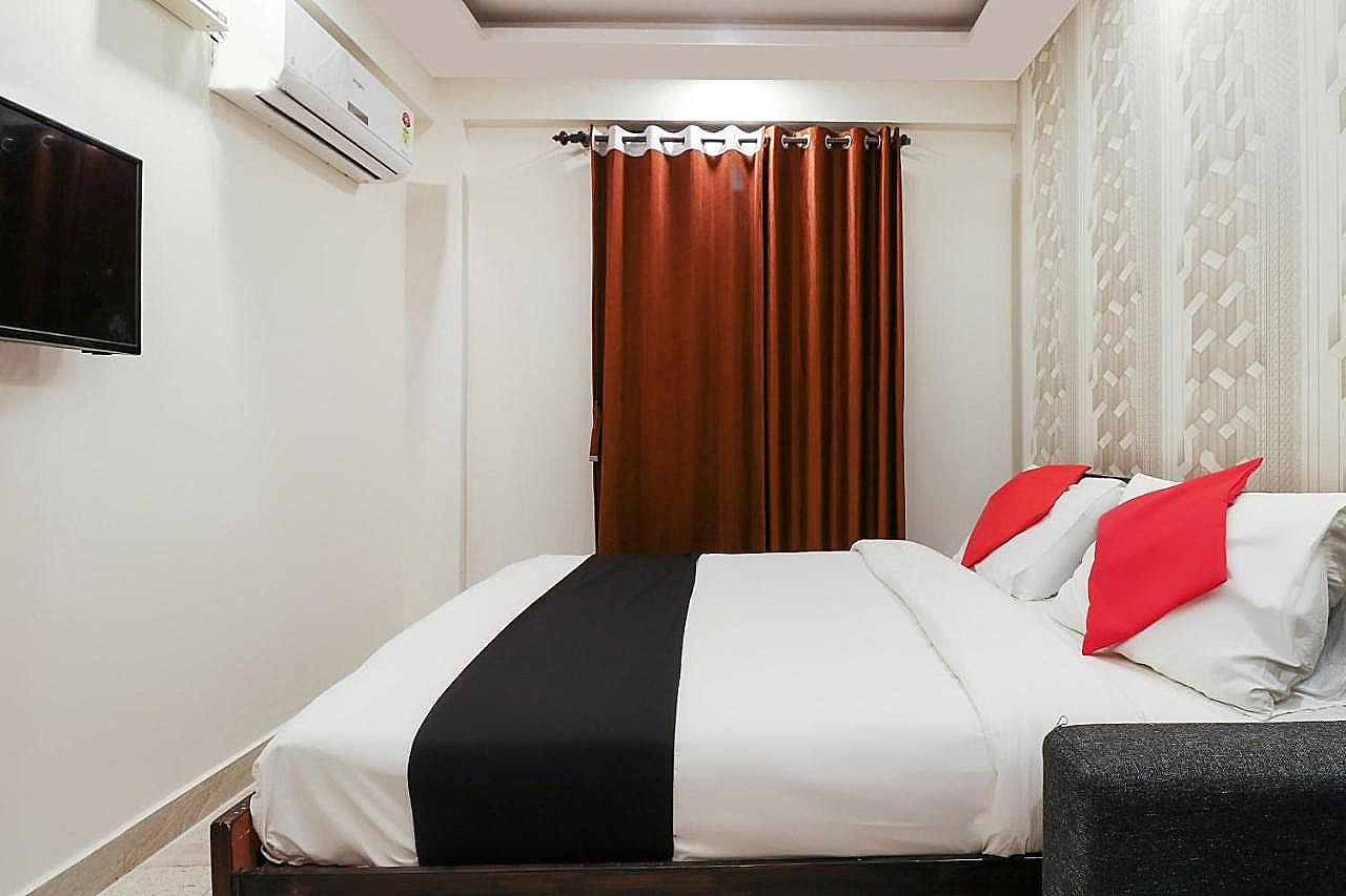 Capital O Golden Inn Deluxe Room 4