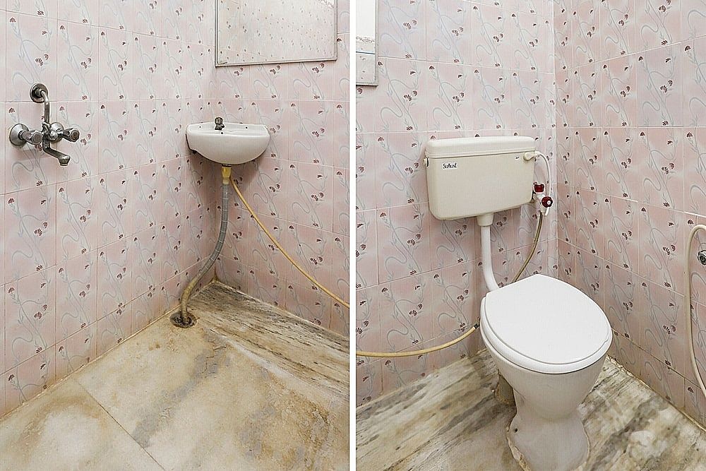 OYO 65719 Sree Ganesh Mahal Deluxe Double Room 9