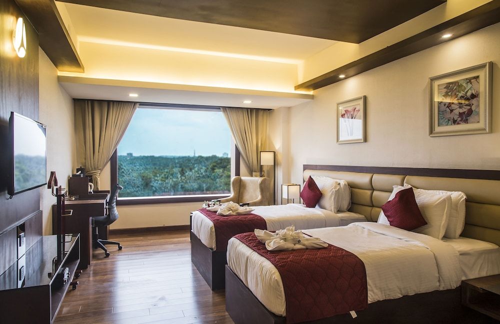 KPM Tripenta Deluxe Twin Room