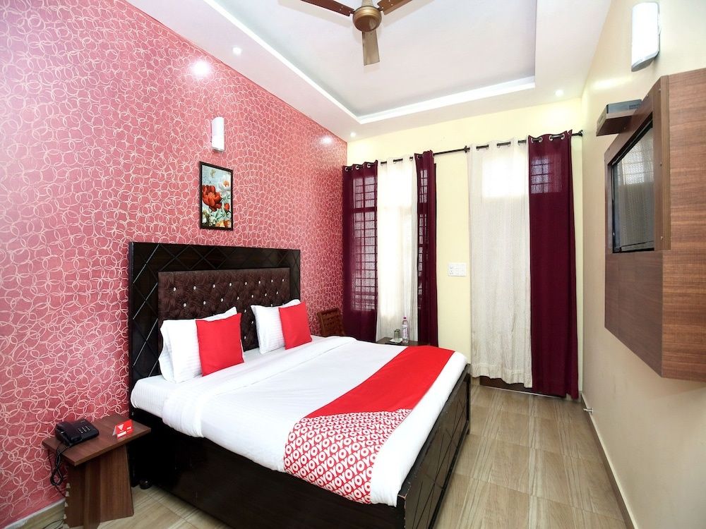 OYO 4548 Hotel Tom Stay Deluxe Room 10