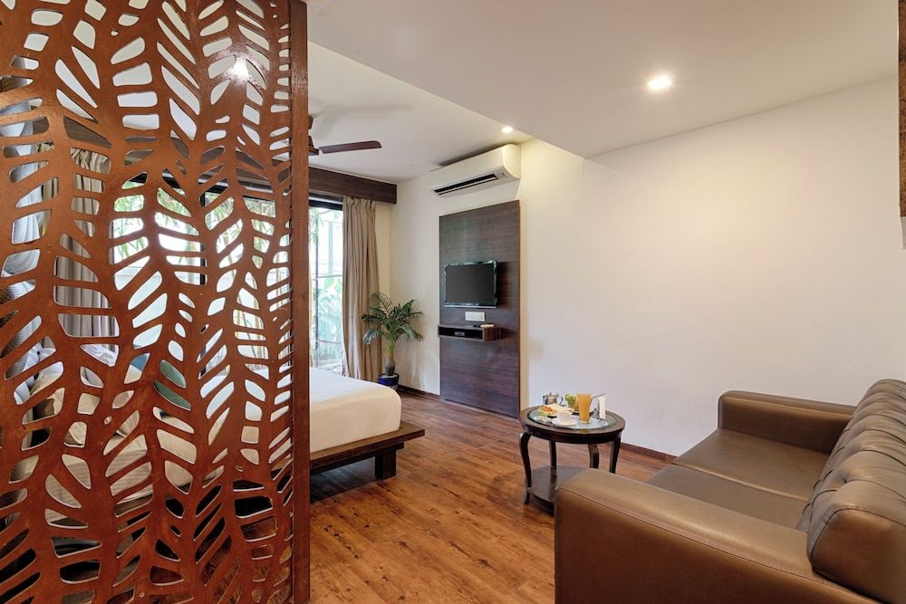 Riva Boutique Apartments Premium room with living area and balcony 10