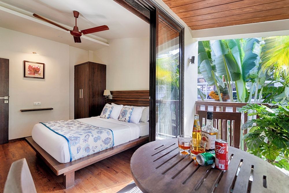 Riva Boutique Apartments Premium room with living area and balcony 3