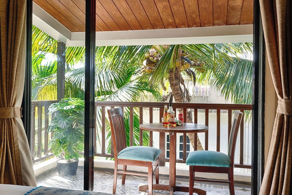 Riva Boutique Apartments Premium room with living area and balcony 5