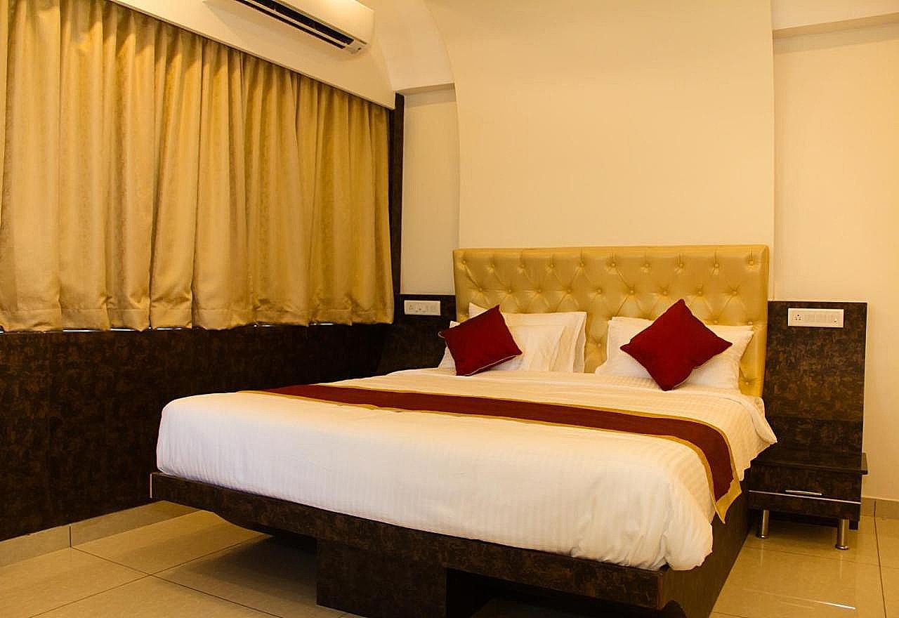 Golden Amulya Rest Wings Near Airport Standard Room