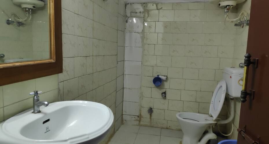 Hotel Brahma Kamal Deluxe Three Bed 3