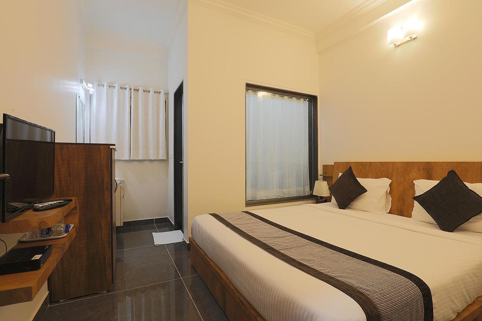 Harmal's Residency Deluxe Room 10