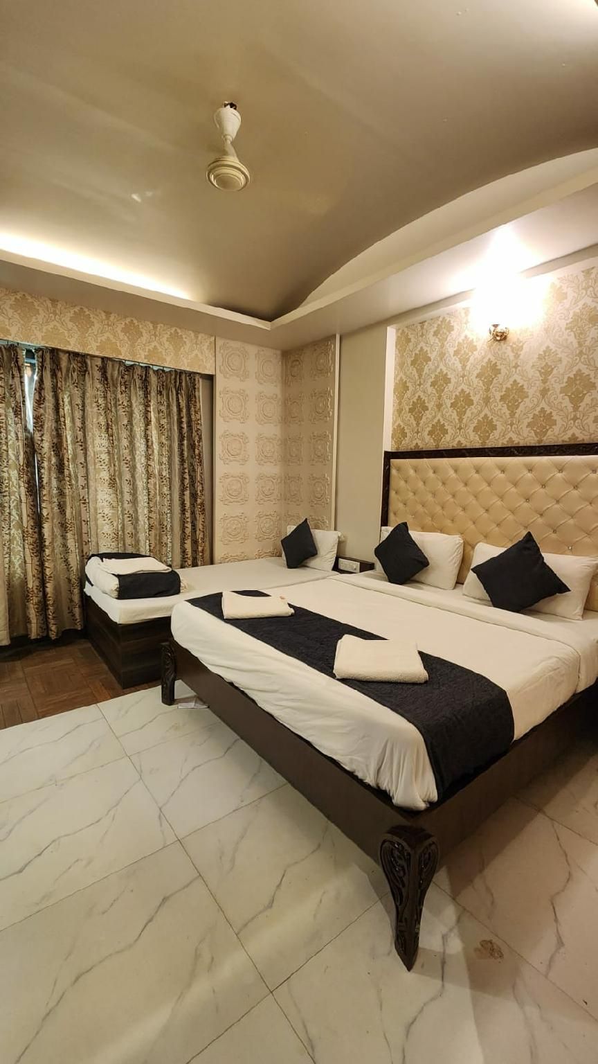 Triple Deluxe Room