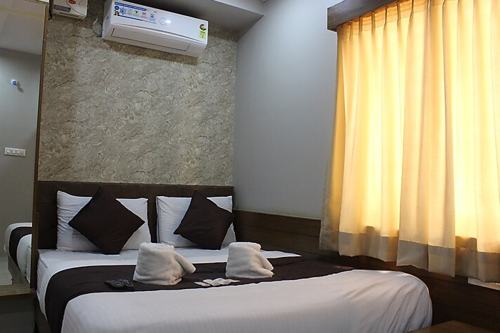 Olivia Inn & Suites Deluxe Room Non AC