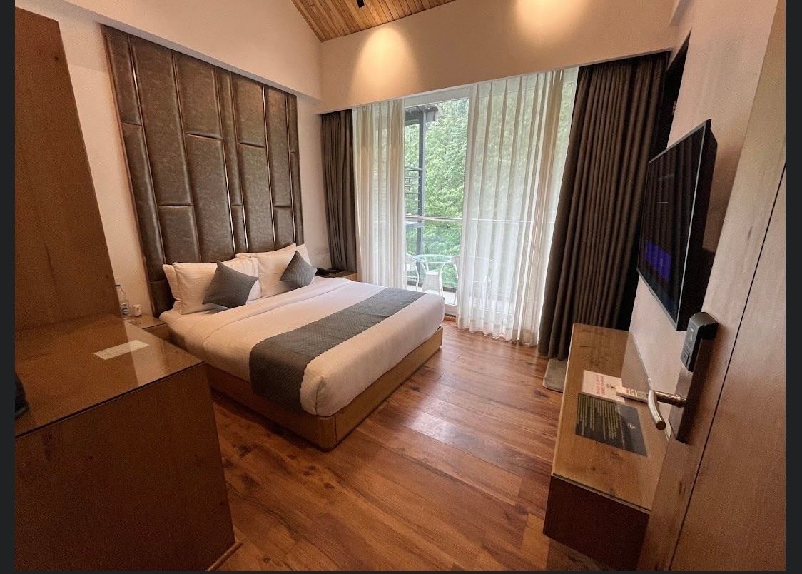Moksha Riverside Resort Deluxe River Facing with Balcony 5