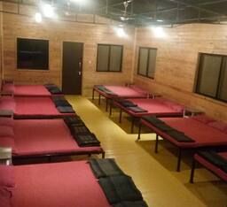 Non-A/c wooden dormitory.